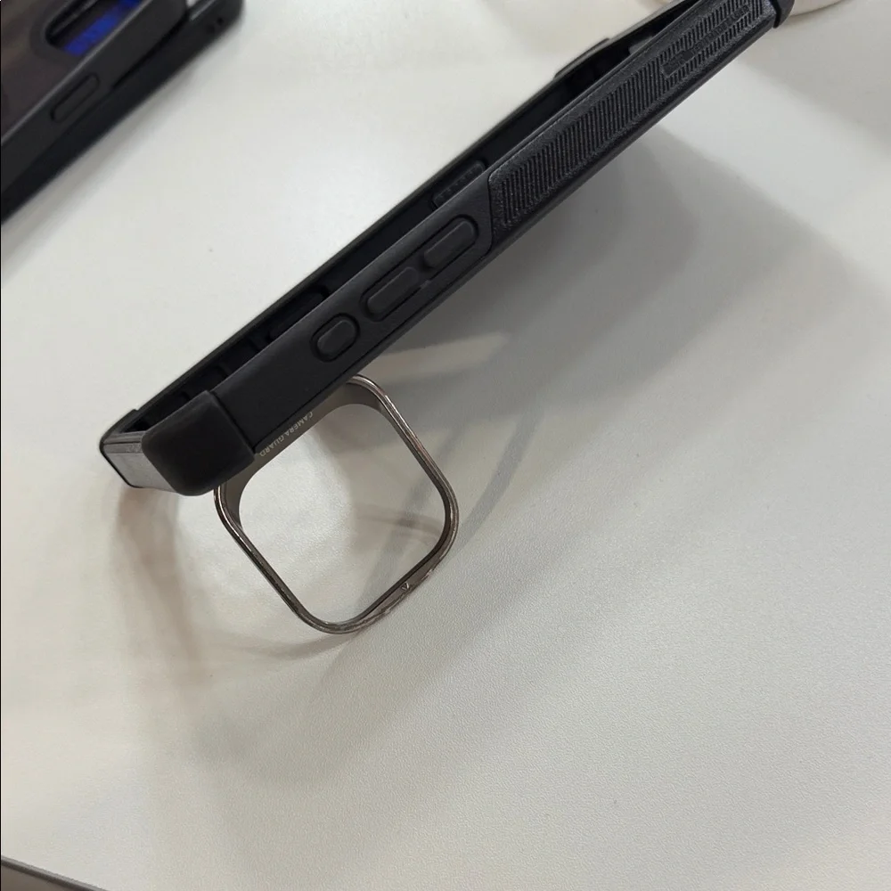Sleek Black Phone Case with Metal Accents